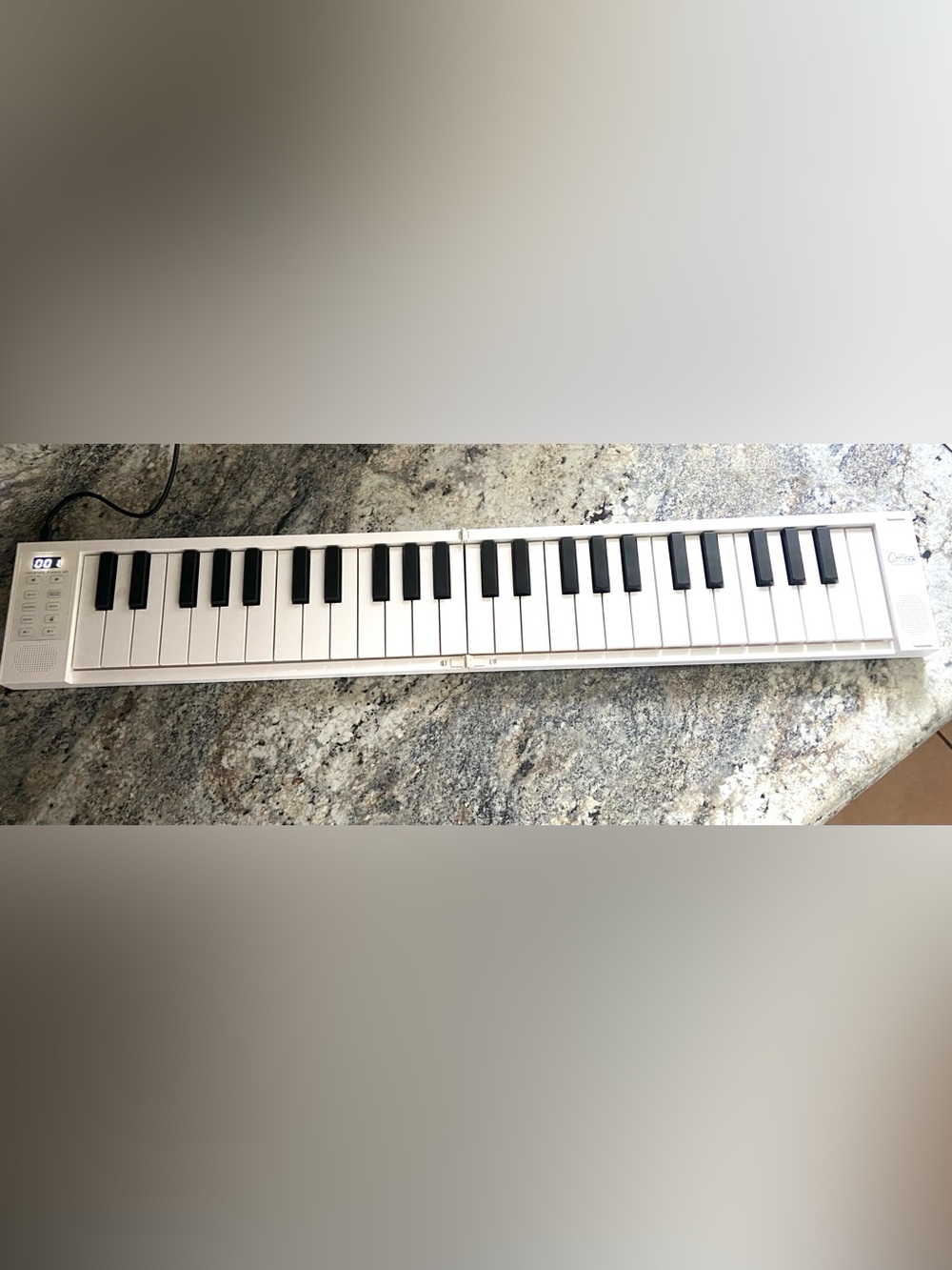 Carry on Foldable Keyboard 49 keys chargeable